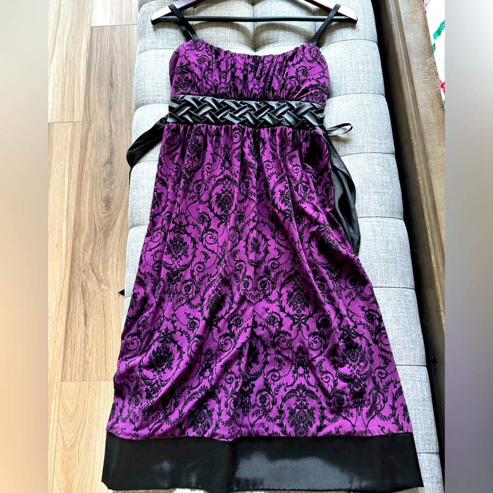 Young ladies size medium purple & black dress. Brand name Intrigue.